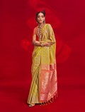 Mustard yellow traditional silk saree with intricate weaving