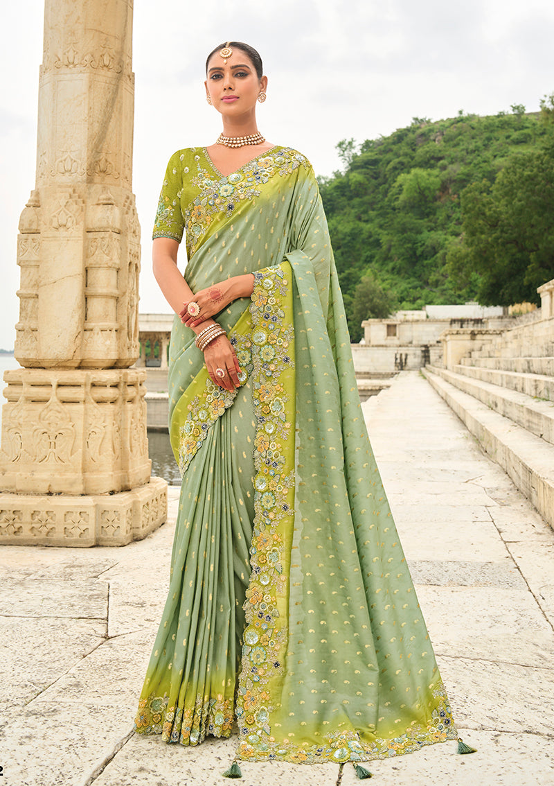 Pistachio viscose tissue silk saree with detailed embroidery and cutwork border