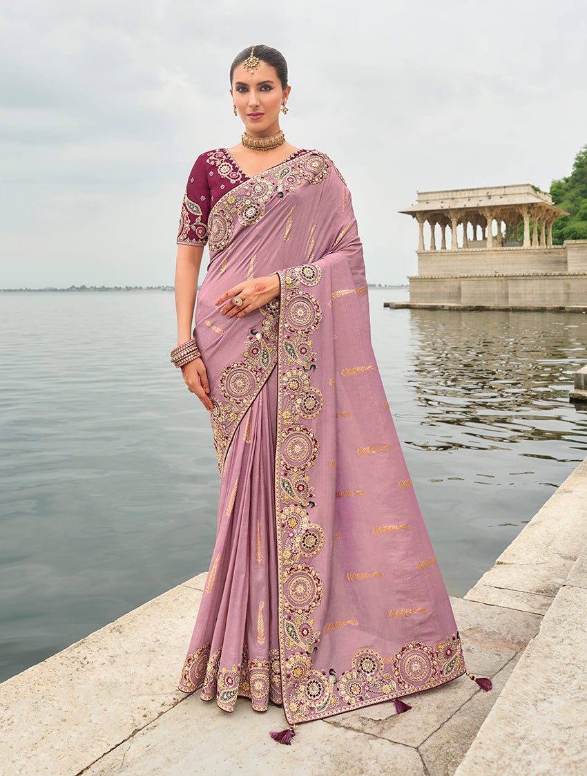 Mauve Viscose Tissue Silk saree with intricate embroidery and cutwork border