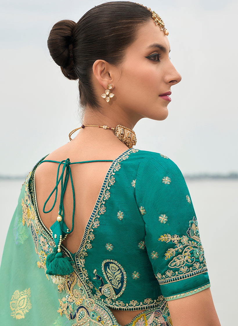 Turquoise Viscose Tissue Silk Saree with Cutwork Border