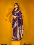 Dark purple silk blend saree with intricate gold zari weaving and two-toned fabric texture