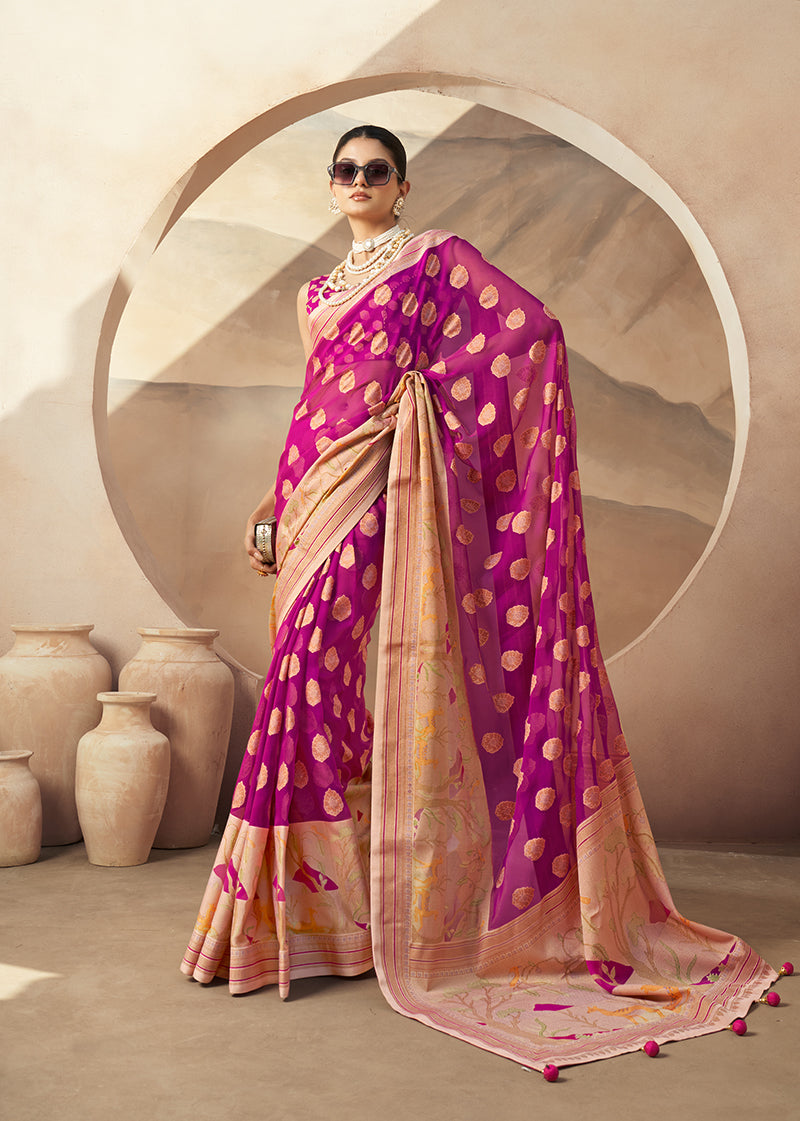 Magenta and rani georgette saree with zari print and classic border