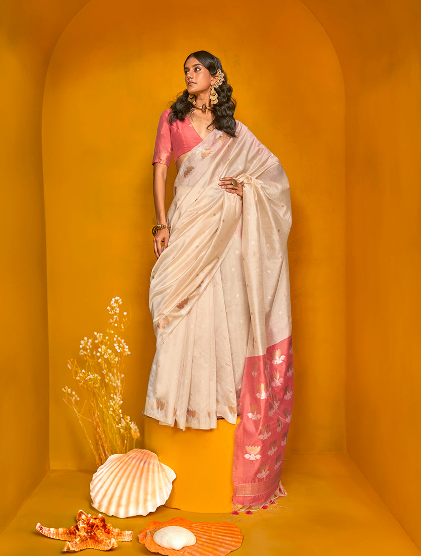 Cream color handloom silk saree with metallic zari weaving design