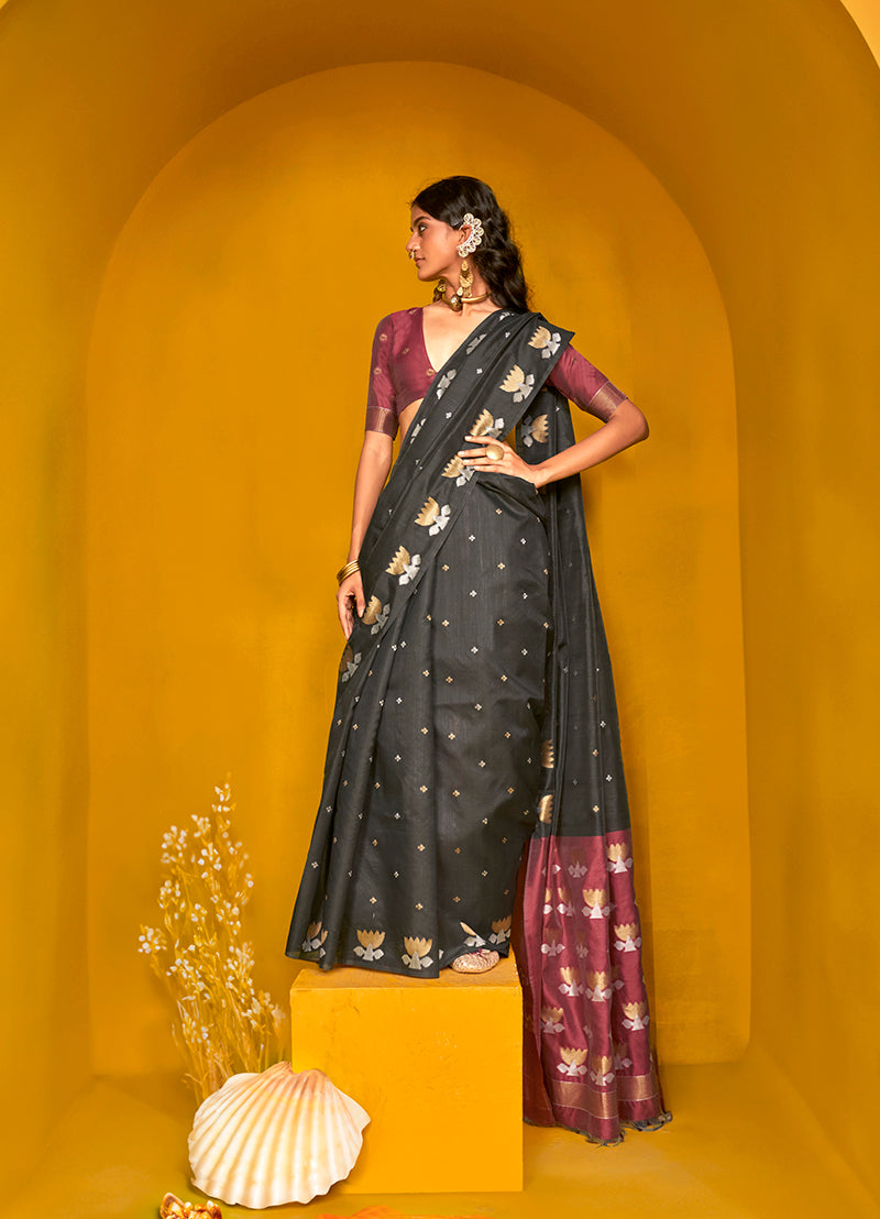 Black handloom silk designer saree featuring intricate traditional zari weaving