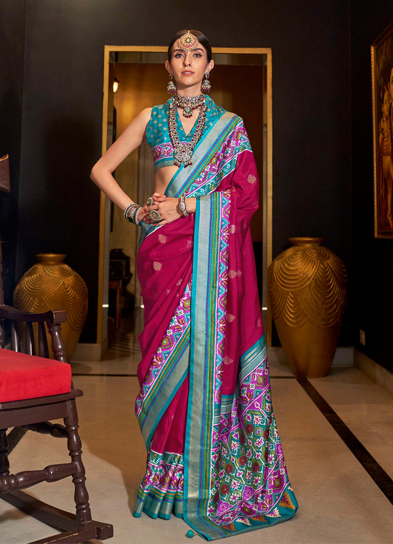 Vibrant Rani Pink Silk Saree featuring traditional Patola print designs