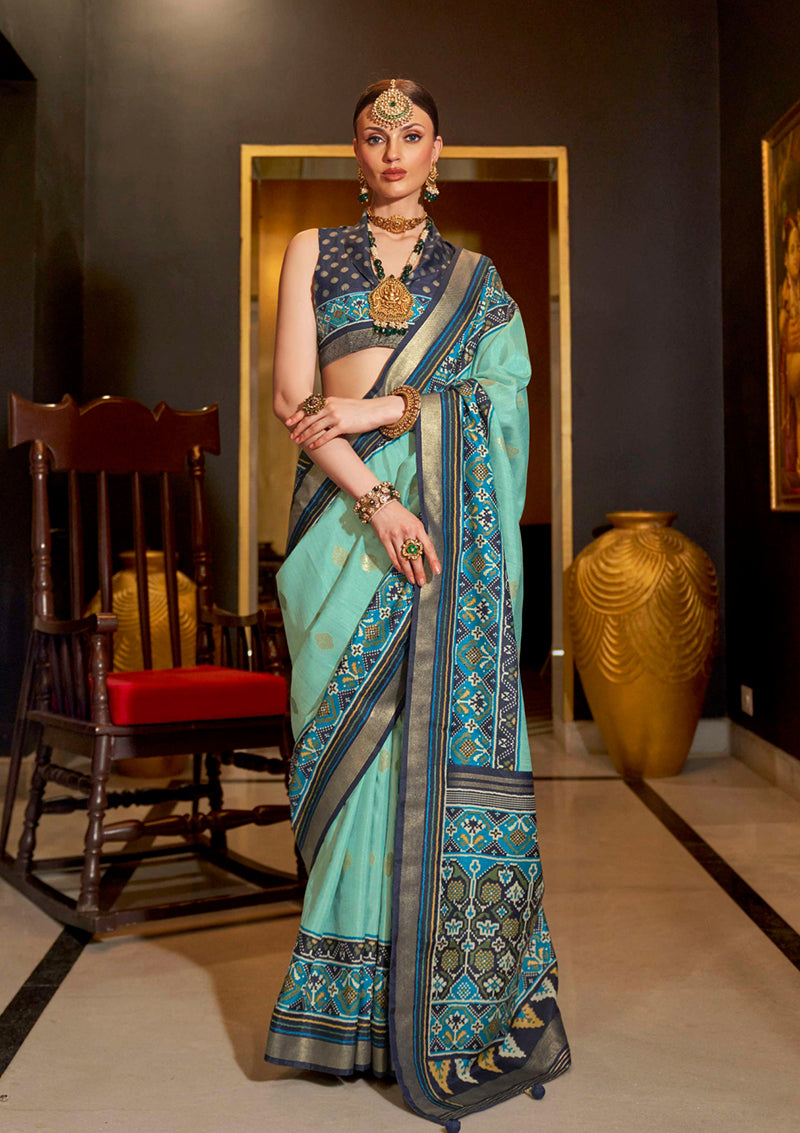 Sea green designer silk saree with Patola print details