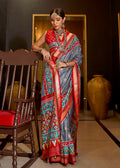 Grey silk designer saree with detailed Patola print patterns