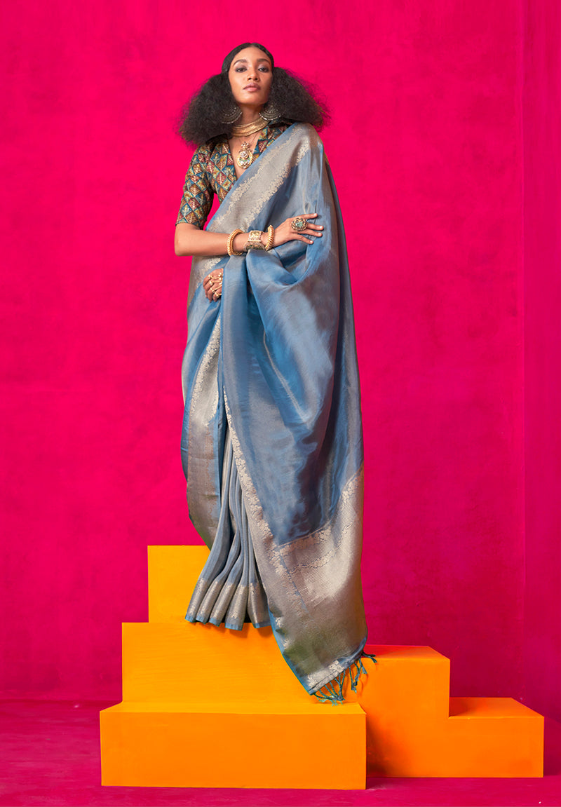 Sky blue traditional tissue silk saree with intricate weaving pattern