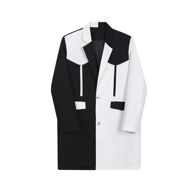 Women's black and white contrast loose-fit trench coat styled casually on a model.