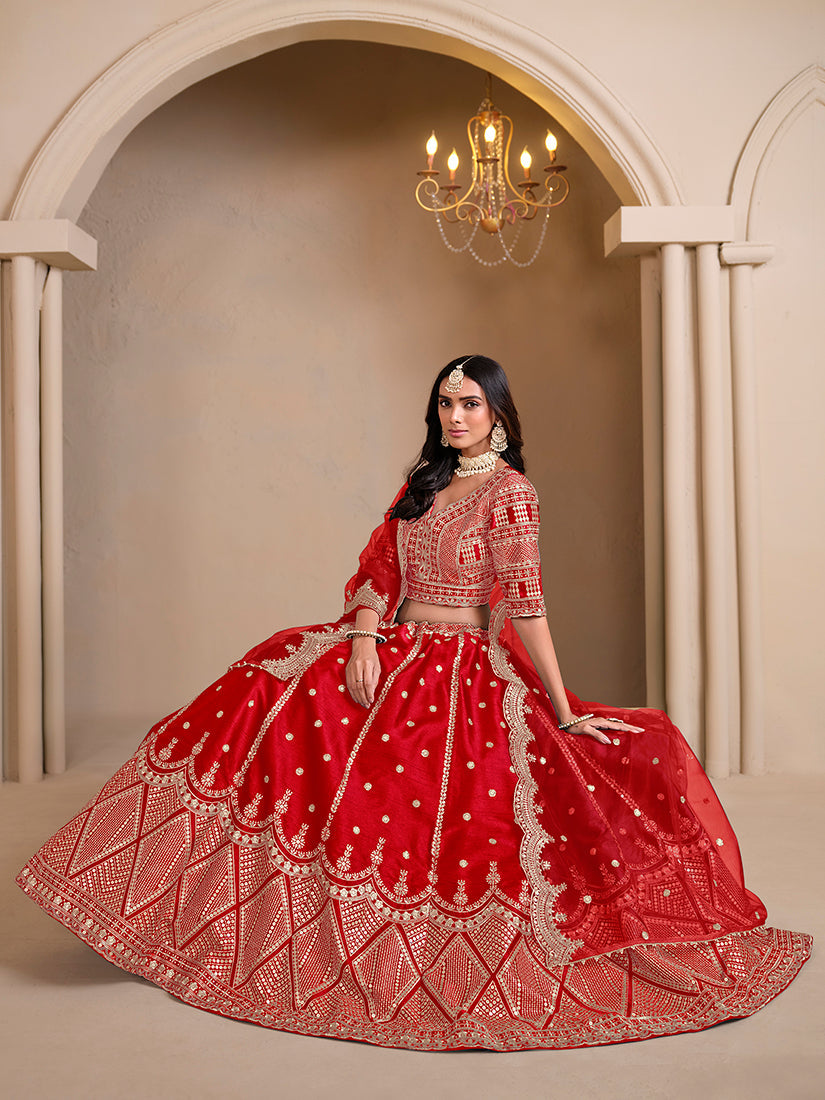 Red art silk embroidered lehenga choli with festive design