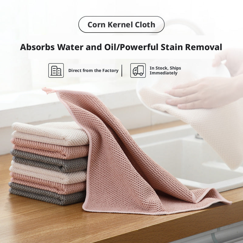 Gray 30x30cm corn fiber cleaning cloth folded on a neutral surface