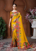 Mustard color Dola silk traditional saree with elegant woven patterns