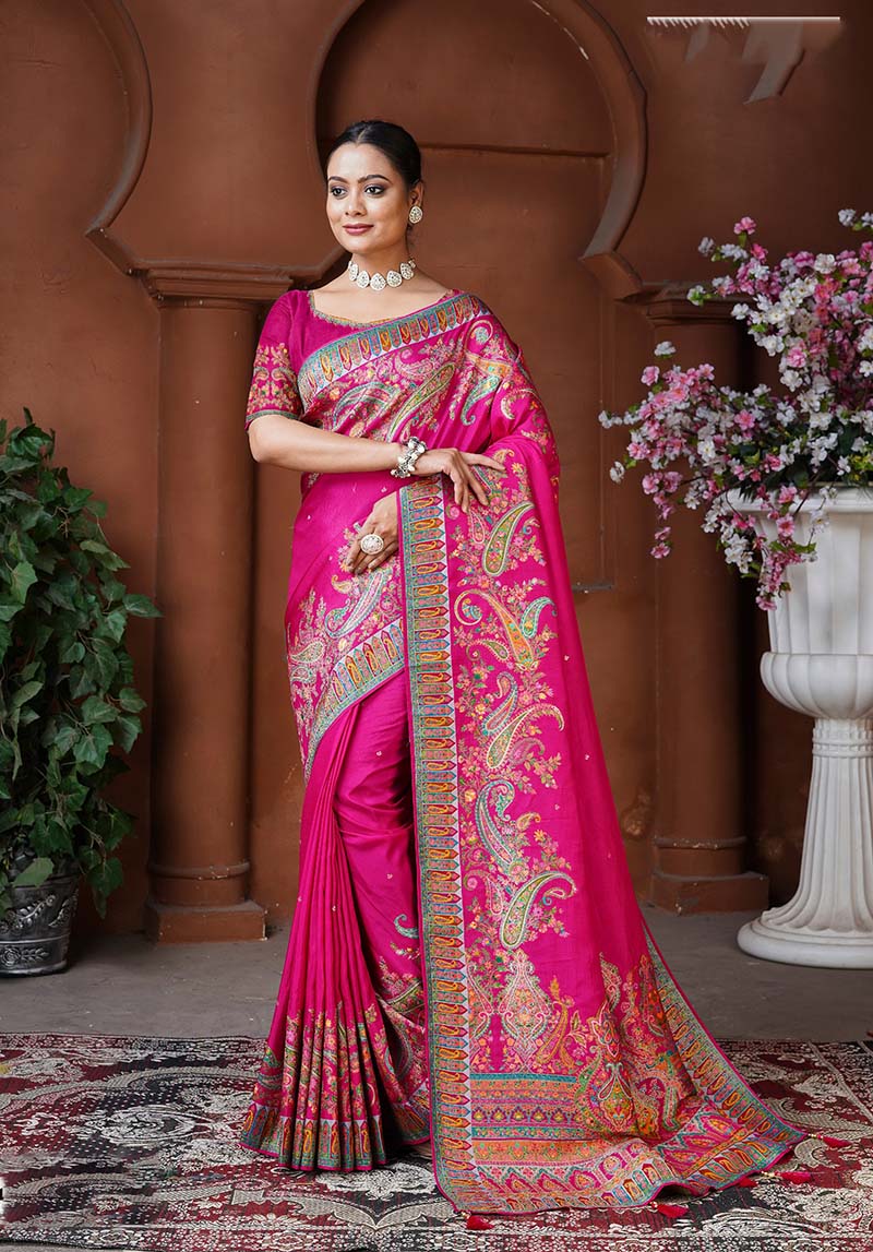 Rani pink color weaving dola silk traditional saree with intricate woven details