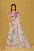 Elegant off white organza brasso saree with printed patterns and matching blouse