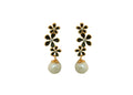 Close-up of elegant golden, white, and black AD earrings by Joban Fashion
