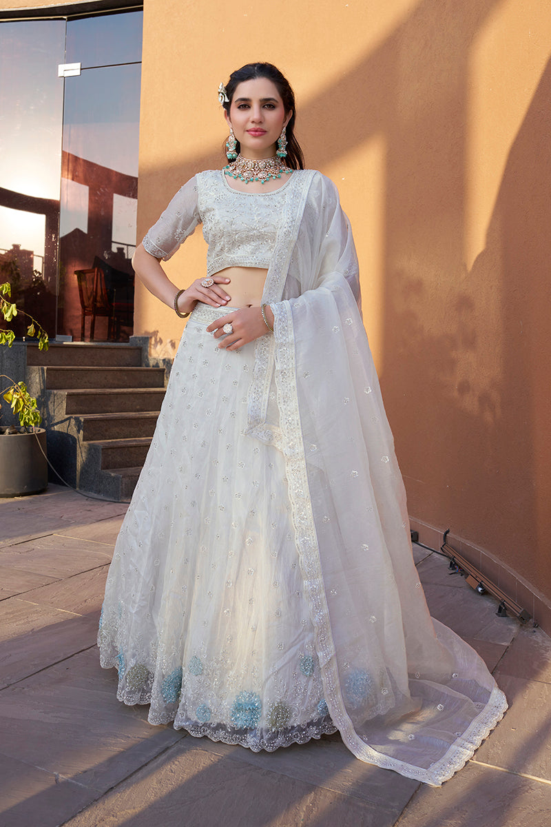White art silk A-line lehenga choli with elegant embroidery for engagements.