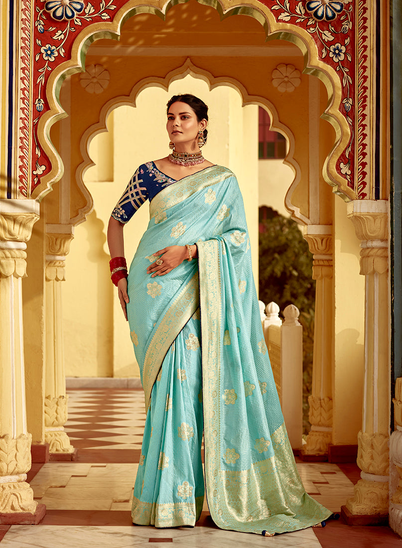 Sky blue Dola silk saree with intricate Banarasi weaving patterns for weddings