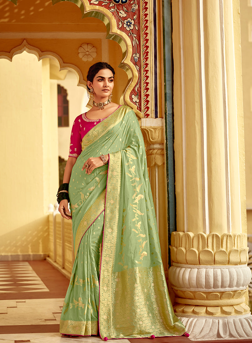 Mint Green wedding saree with intricate golden Zari weaving on Dola silk