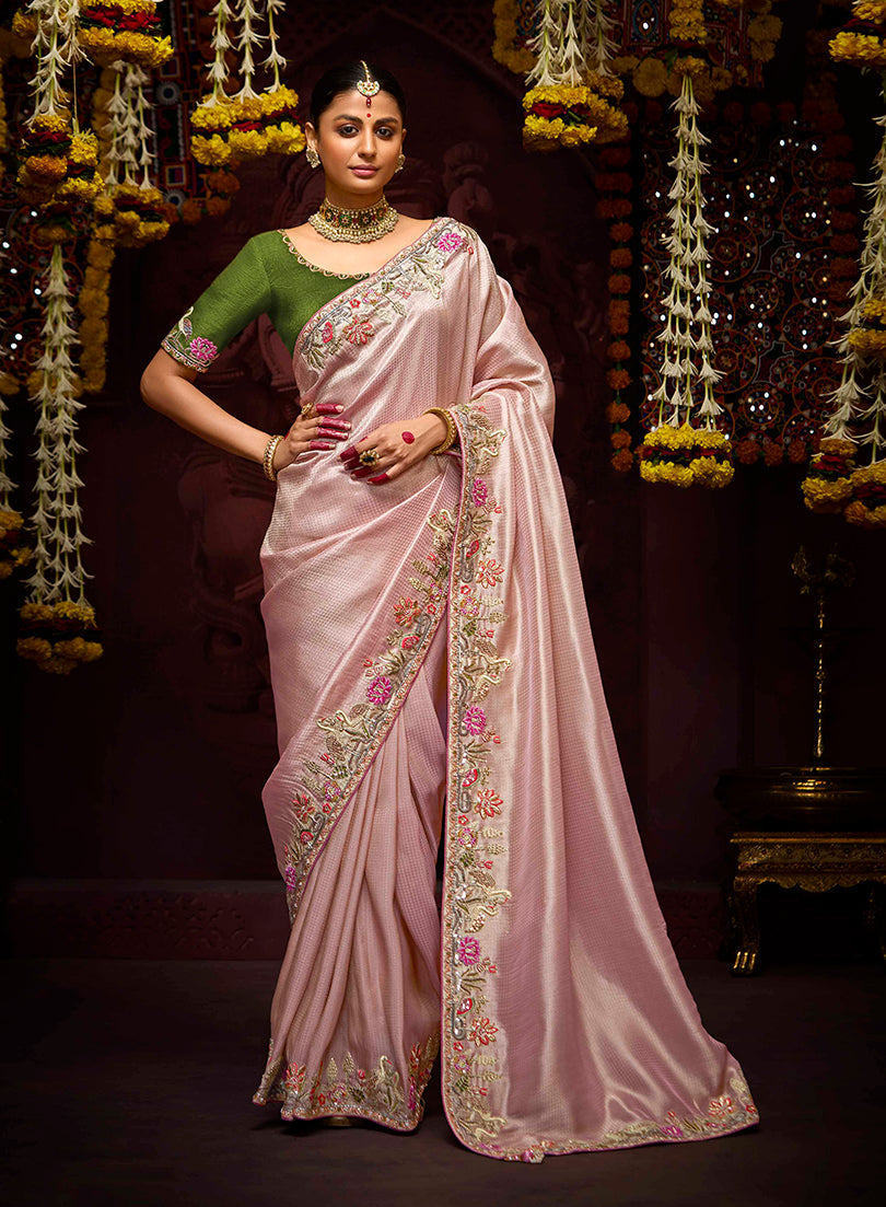 Contemporary dual-tone purple and pink Kanjivaram silk saree with thread embroidery.