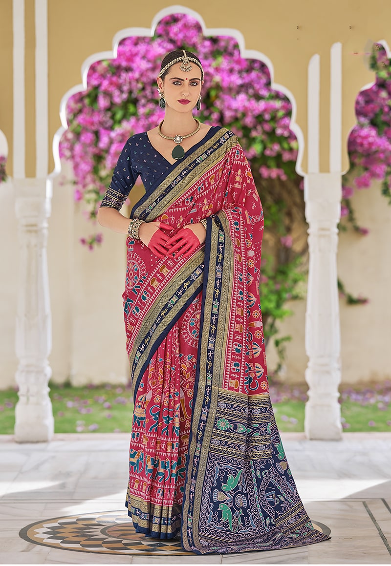 Hot pink silk saree adorned with elegant foil print detailing.