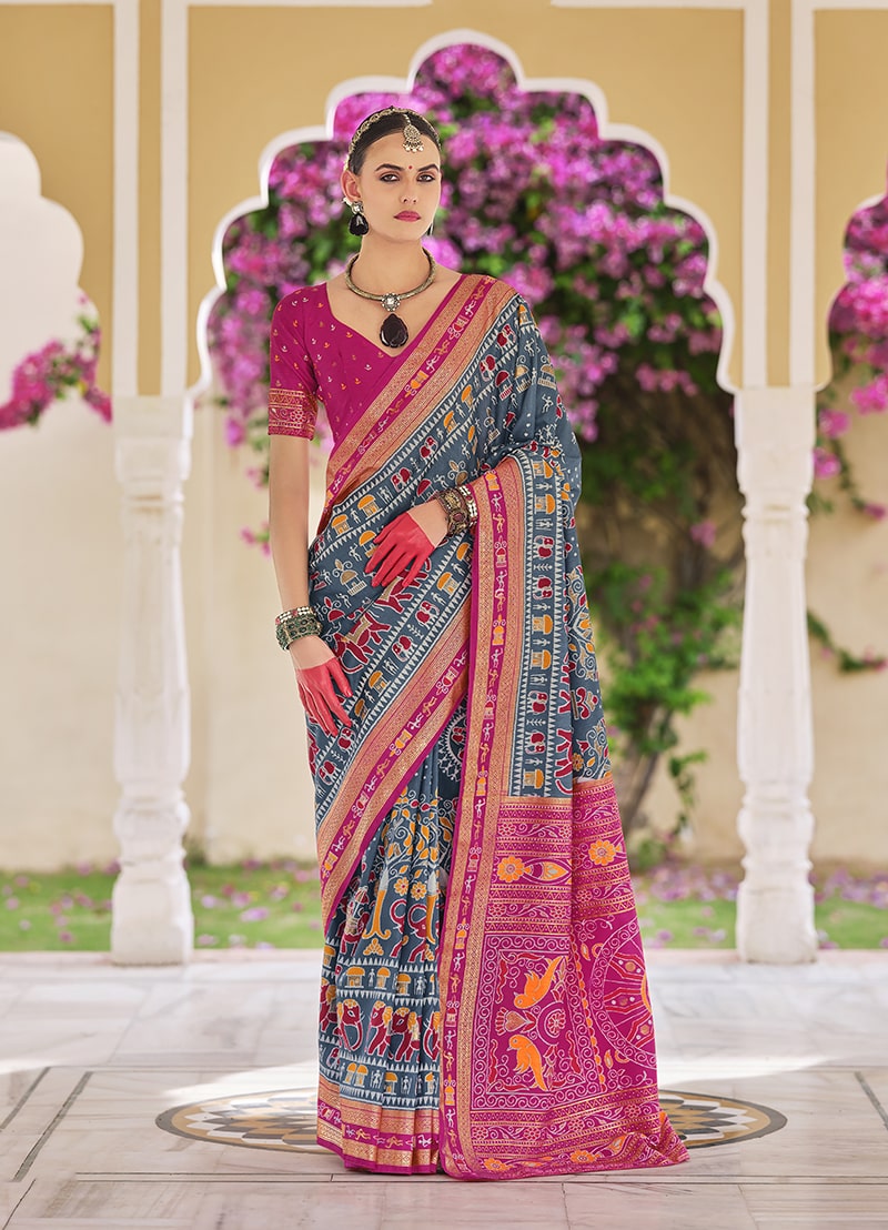 Grey silk saree with delicate foil print detailing for festive occasions
