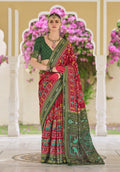 Classic red silk saree featuring sophisticated gold foil print patterns