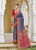 Navy blue silk saree with shimmering foil print work
