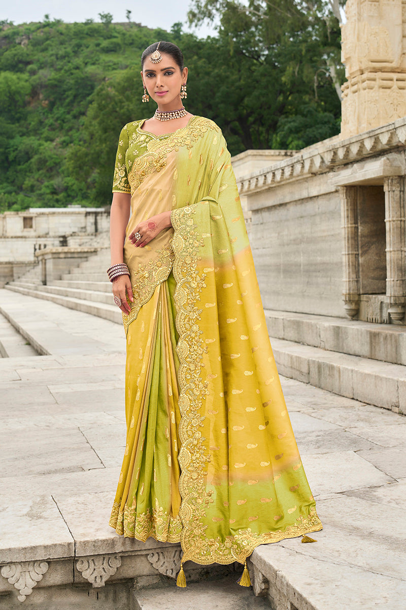 Green and yellow stone embellished silk blend traditional saree