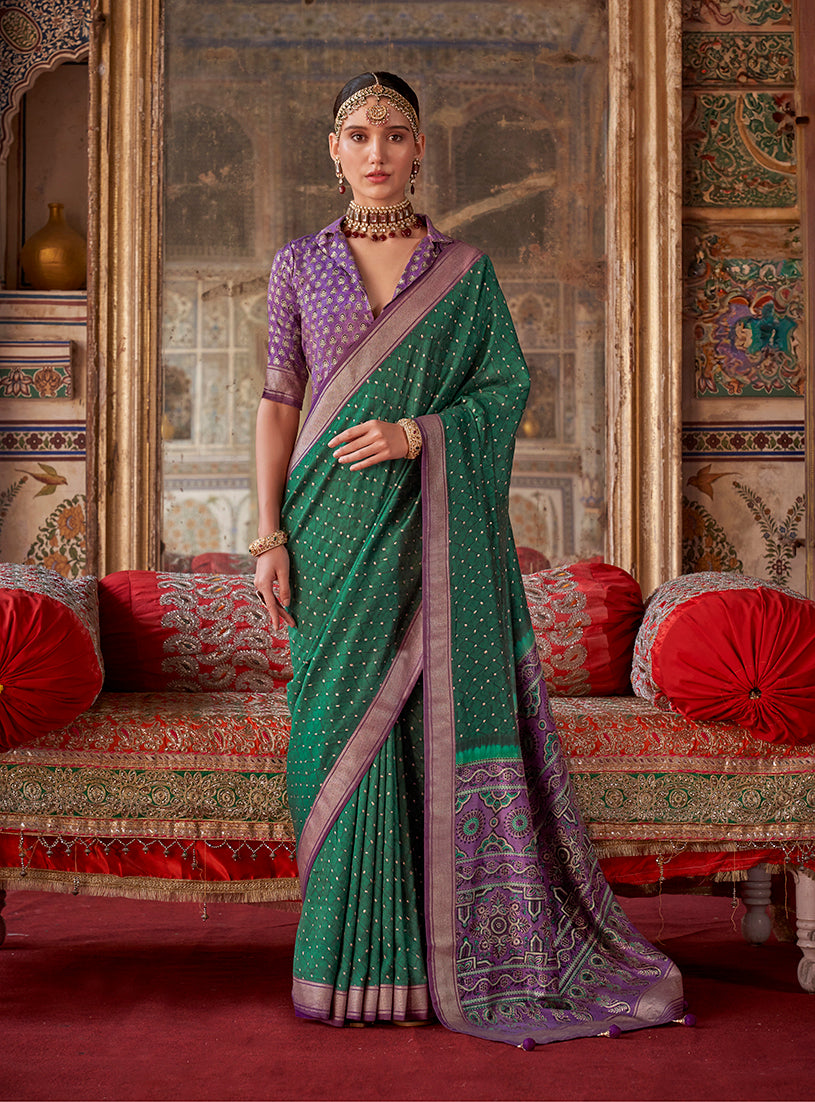 Monjolika Fashion green silk blend contemporary saree with intricate prints