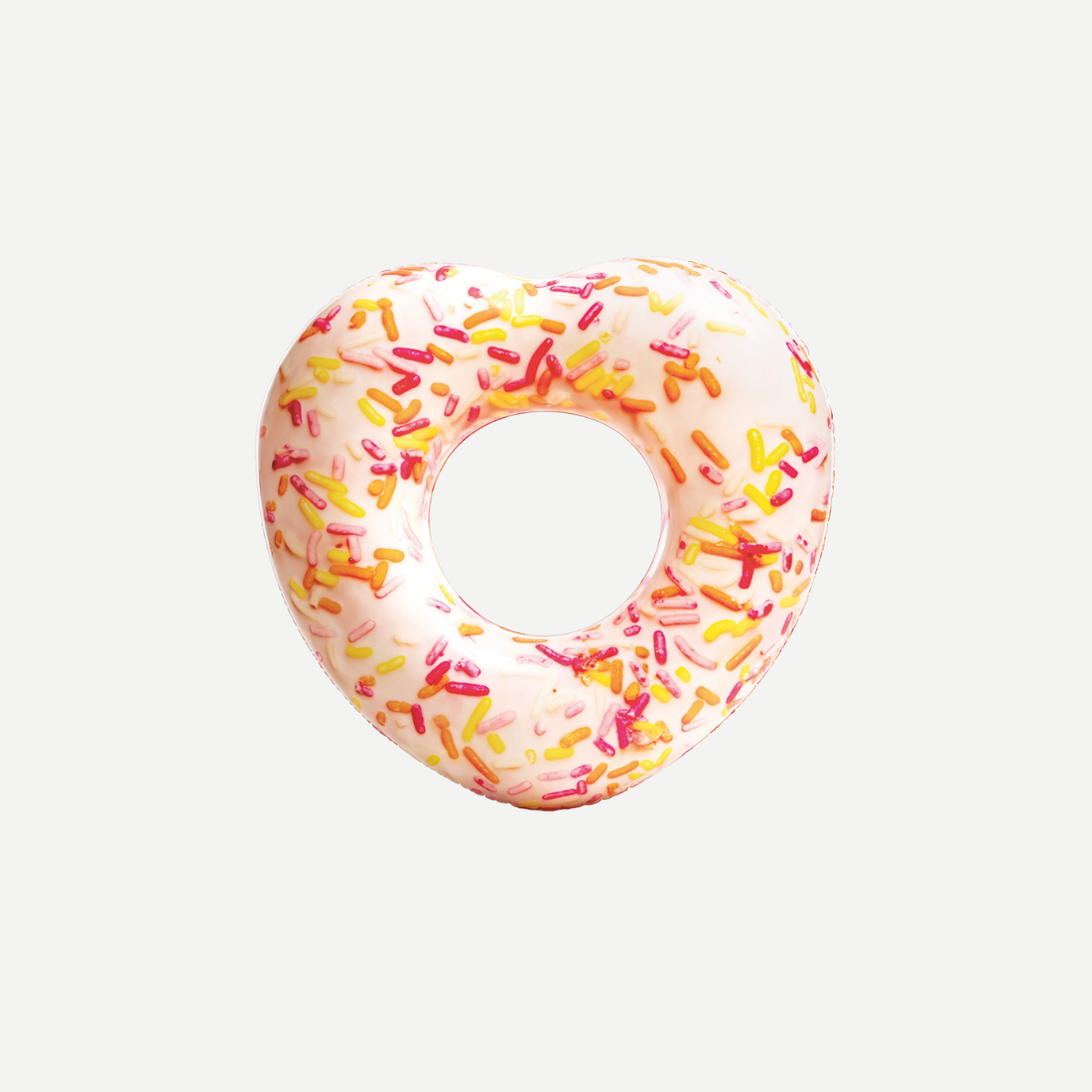 Heart-shaped inflatable donut pool float with colorful sprinkles on a neutral background