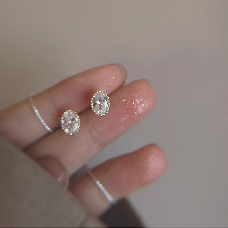 Dainty tiny heart-shaped gold stud earrings suitable for 24/7 comfort