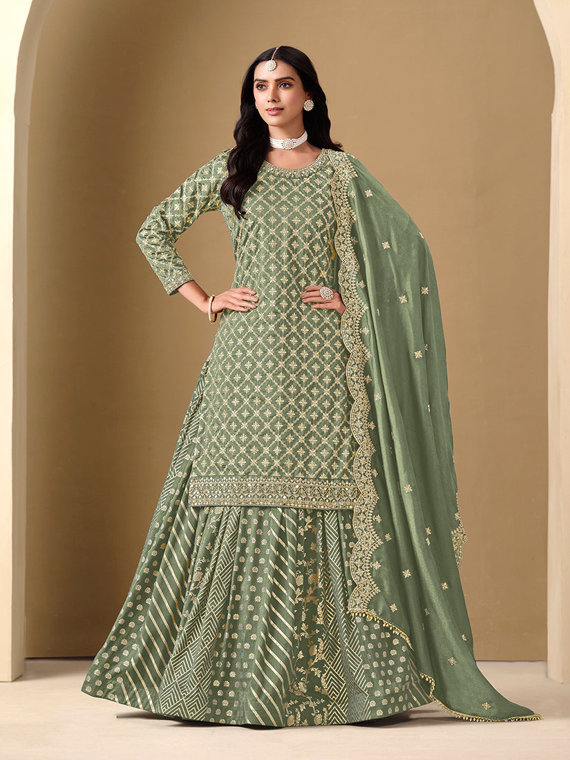 Sage green readymade lehenga choli with elegant jacquard work in soft Dola silk.