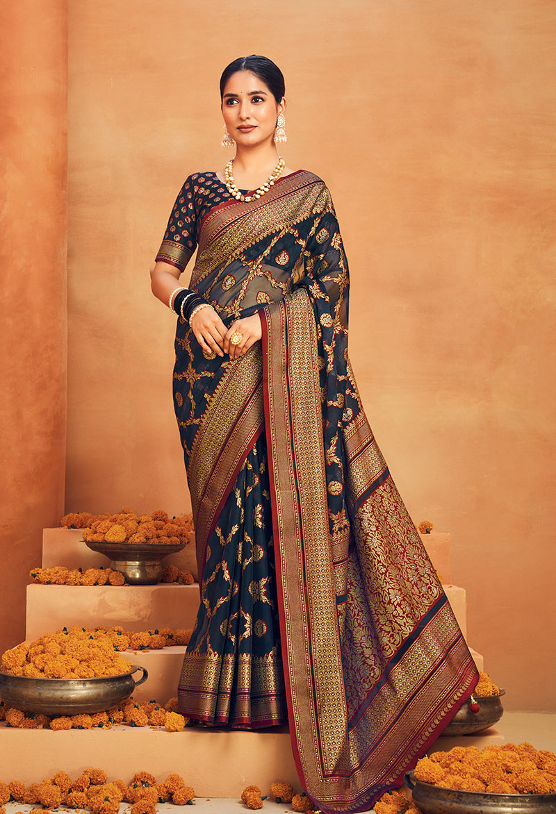 Navy blue georgette saree with elegant zari woven details