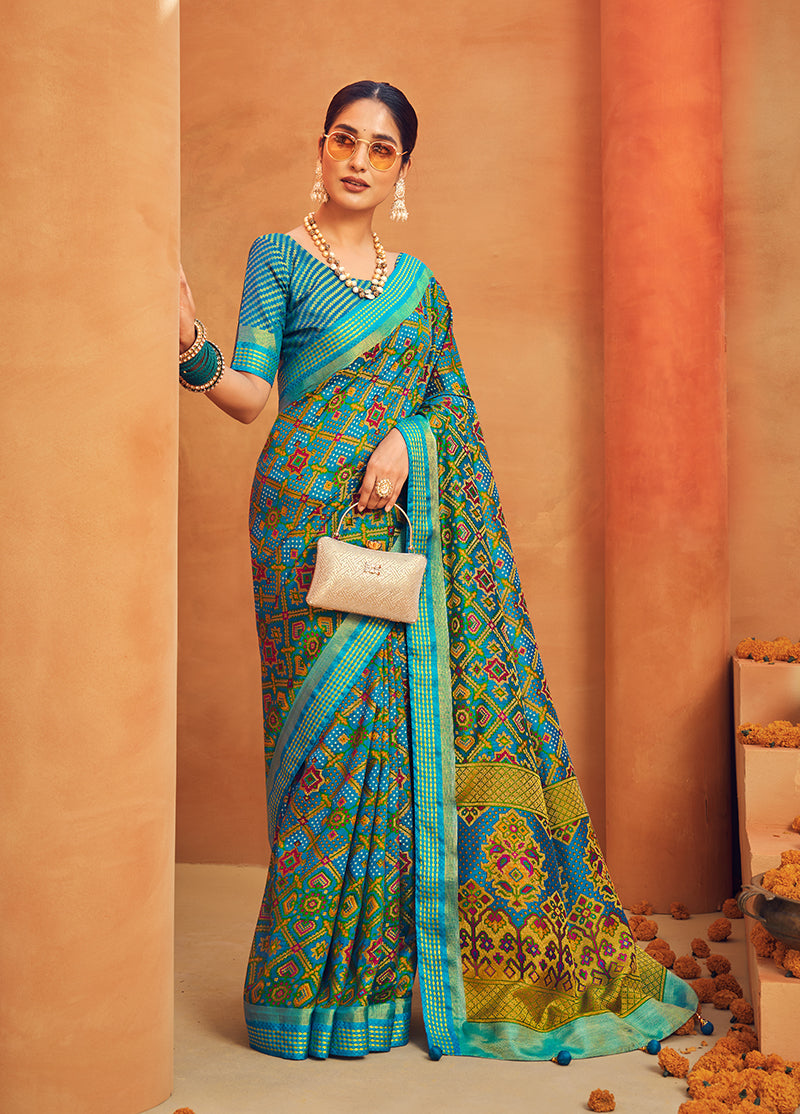 Aqua blue georgette printed saree with ethnic patterns for festival wear