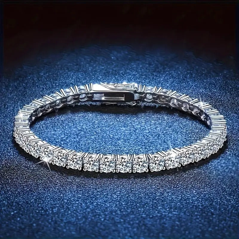 Close-up of a luxurious S925 sterling silver plated tennis chain densely set with sparkling 4mm Zircon rhinestones.
