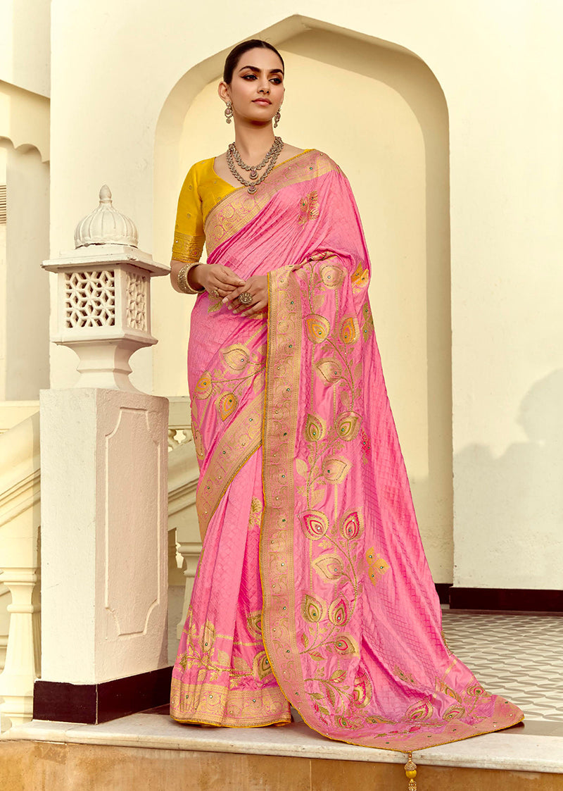Pink silk blend traditional saree featuring intricate weaving and Swarovski crystal details.