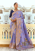 Lavender silk blend traditional saree featuring Swarovski work and elegant weaving