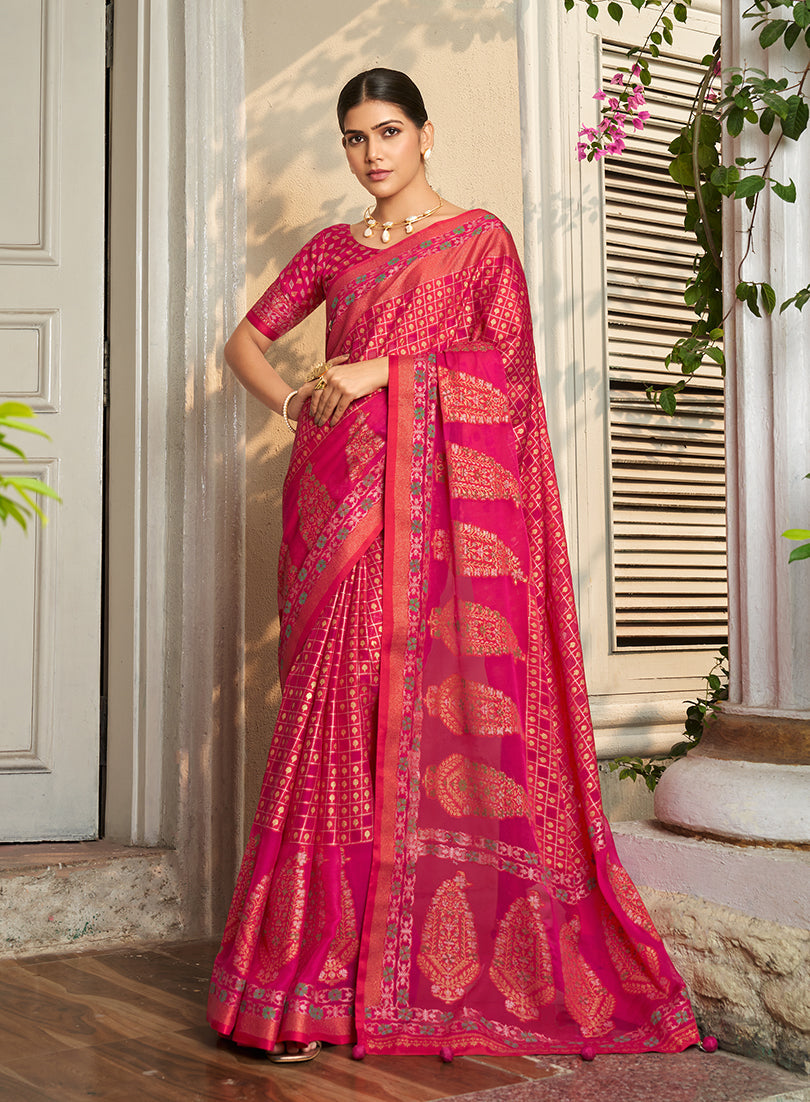 Rani pink georgette printed saree with an elegant fluid drape