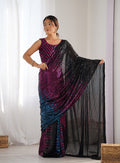 Black georgette saree featuring all-over sequins work