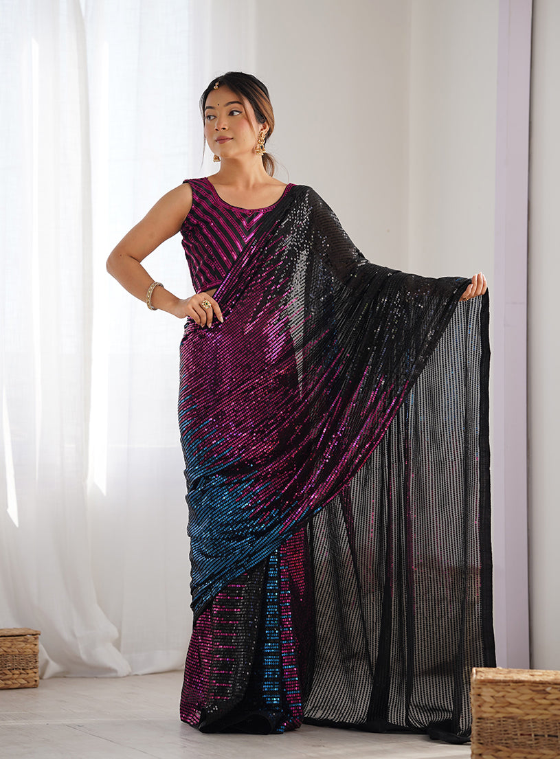 Black georgette saree featuring all-over sequins work