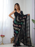 Classic black georgette saree featuring intricate sequin detailing
