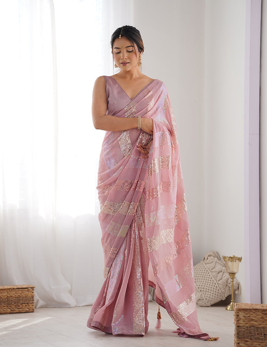 Elegant pink georgette classic saree with detailed sequin embellishments