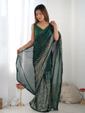 Bottle green georgette saree with all-over sequins detail