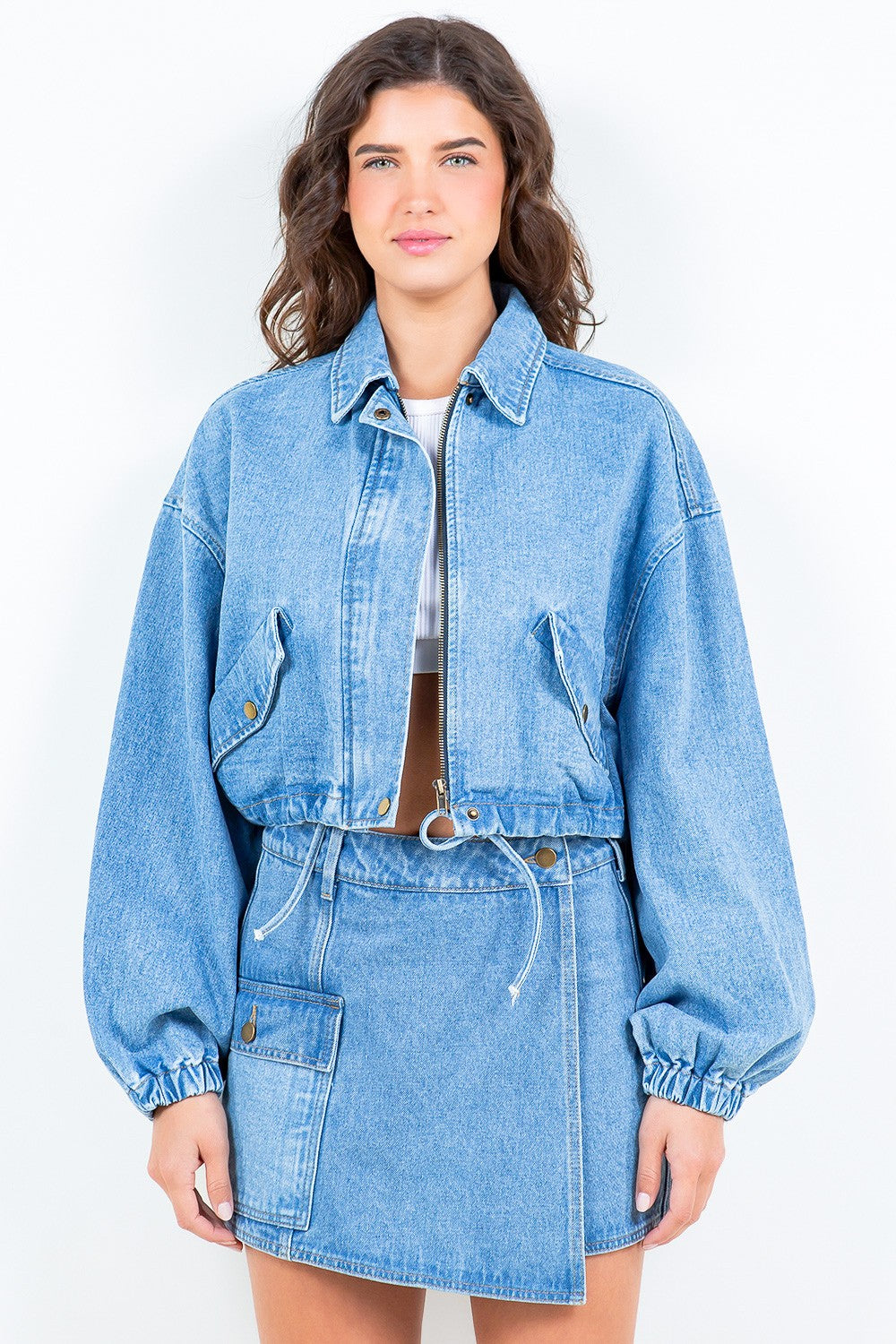 Trendy girls cropped trucker jacket with drawstring waist and zipper front closure