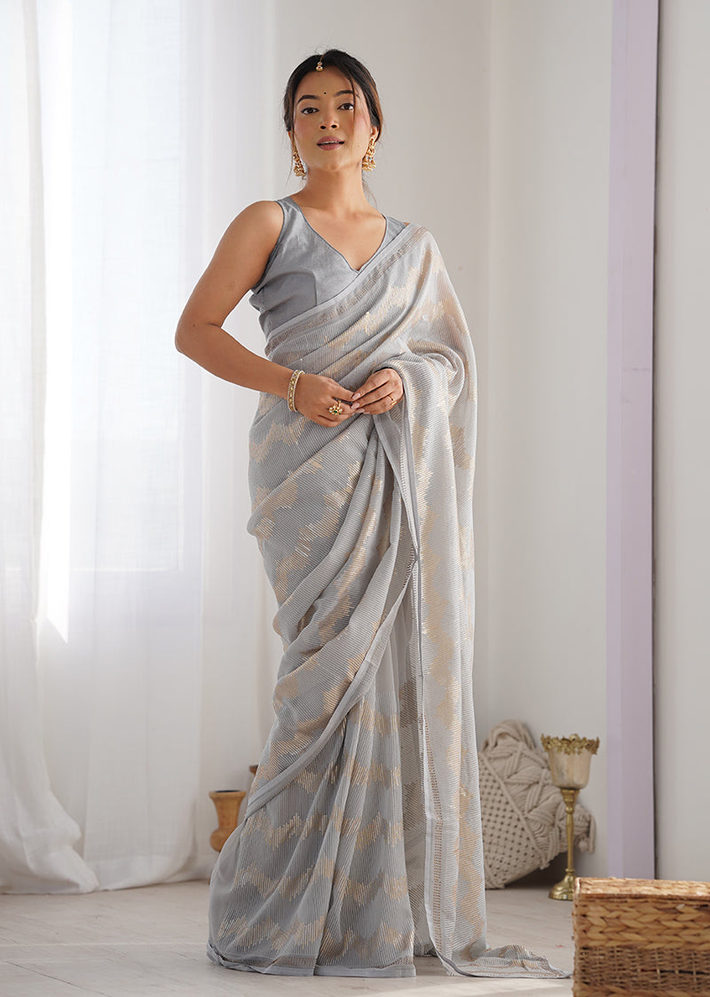 Trendy grey georgette saree with elegant sequin embellishments.