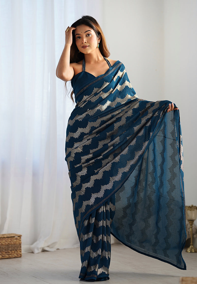 Morpeach color georgette saree embellished with sparkling sequins work.