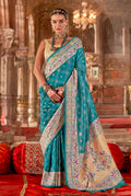 Aqua blue silk blend saree with traditional Bandhej print for festive occasions