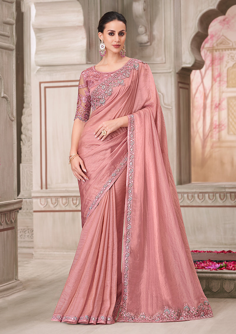 Powder pink georgette satin saree with intricate embroidery