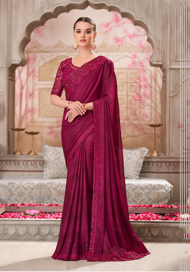 Deep burgundy satin silk saree with detailed embroidery for sangeet events
