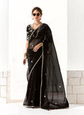 Black tissue saree featuring elegant embroidery and sequin work for a Sangeet event